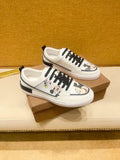 White Graphic Low-Top Sneakers