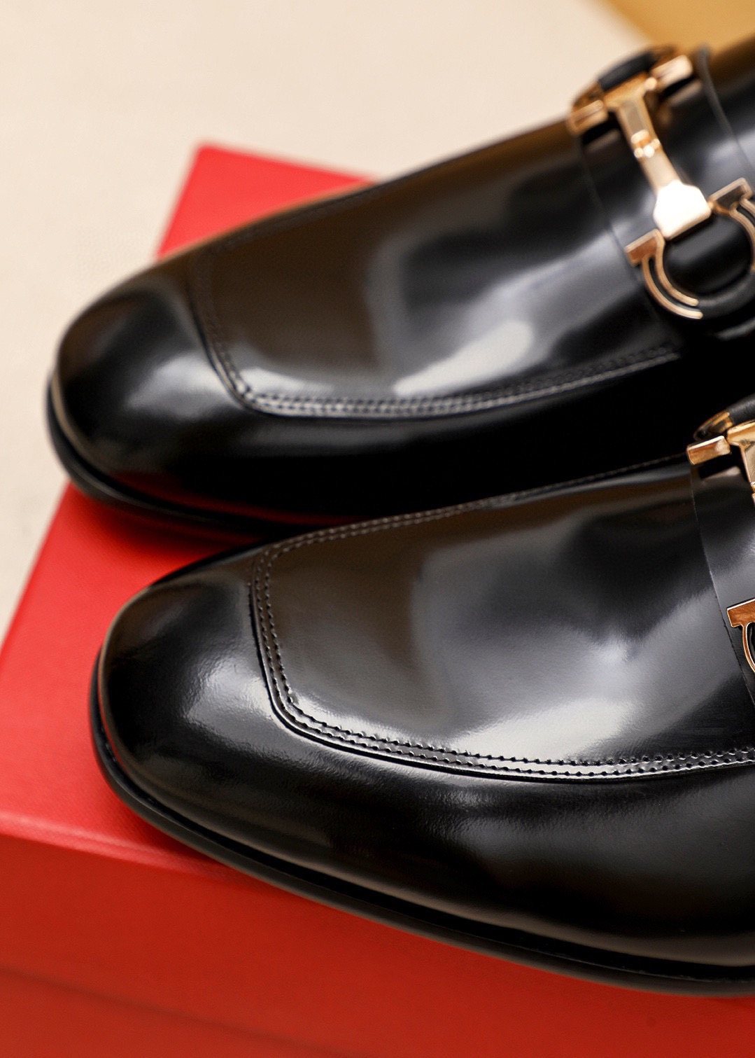Ferragamo Black Buckle Loafers - Metallic Vamp Buckle