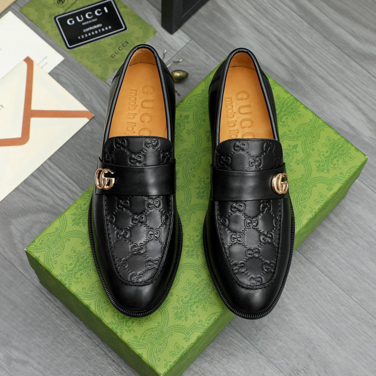 Gucci Black Embossed Loafers with Gold-Tone Detail