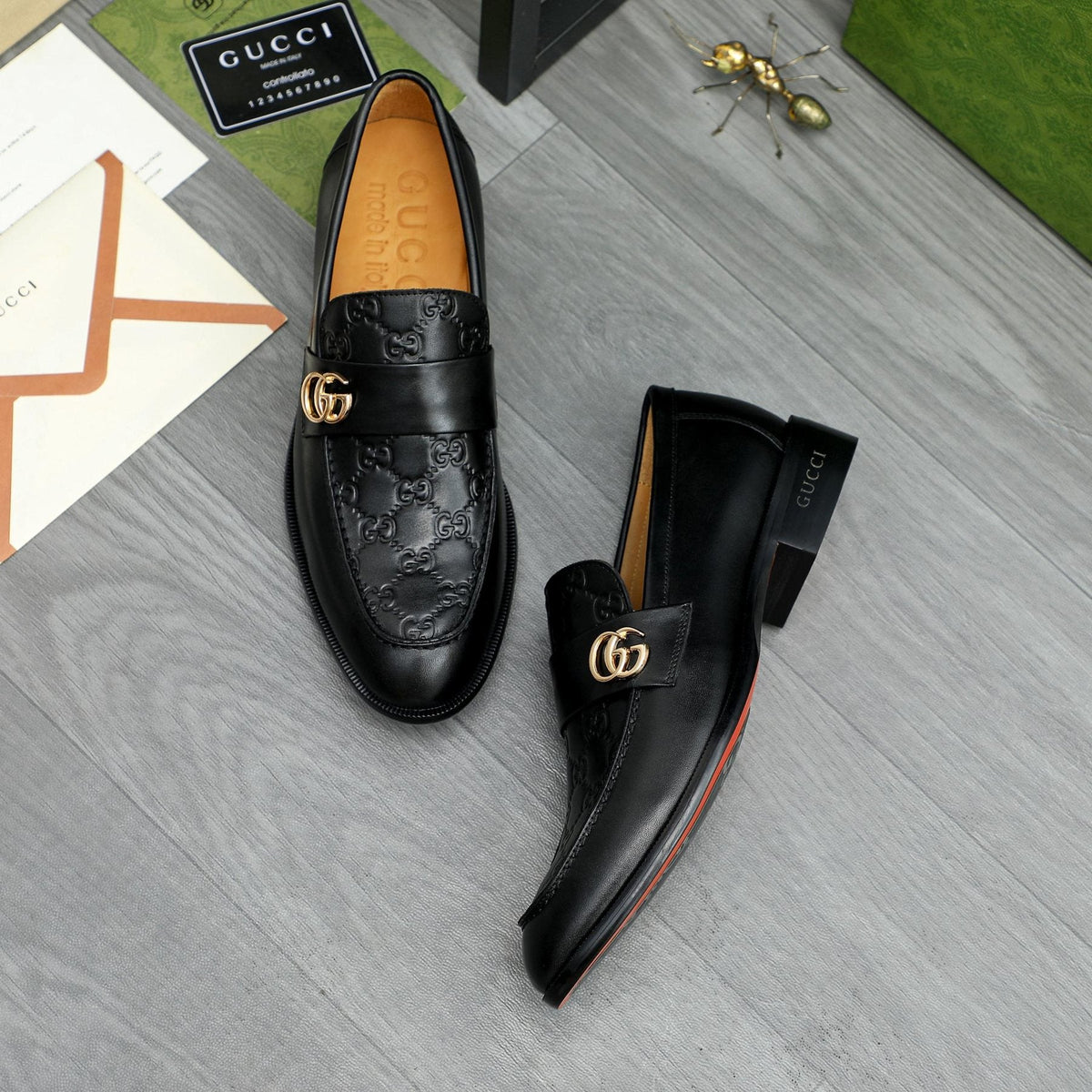 Gucci Black Embossed Loafers with Gold-Tone Detail